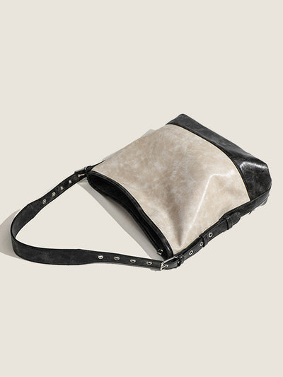 Fashionable women's handbag in color blocks