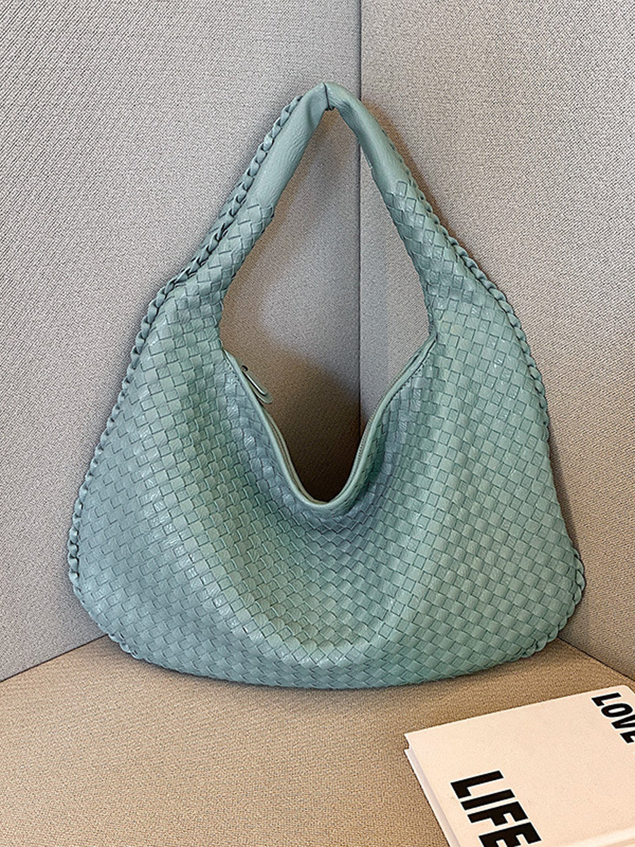 Fashionable woven leather handbag