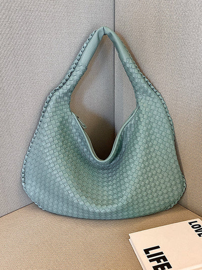 Fashionable woven leather handbag