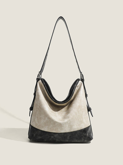 Fashionable women's handbag in color blocks