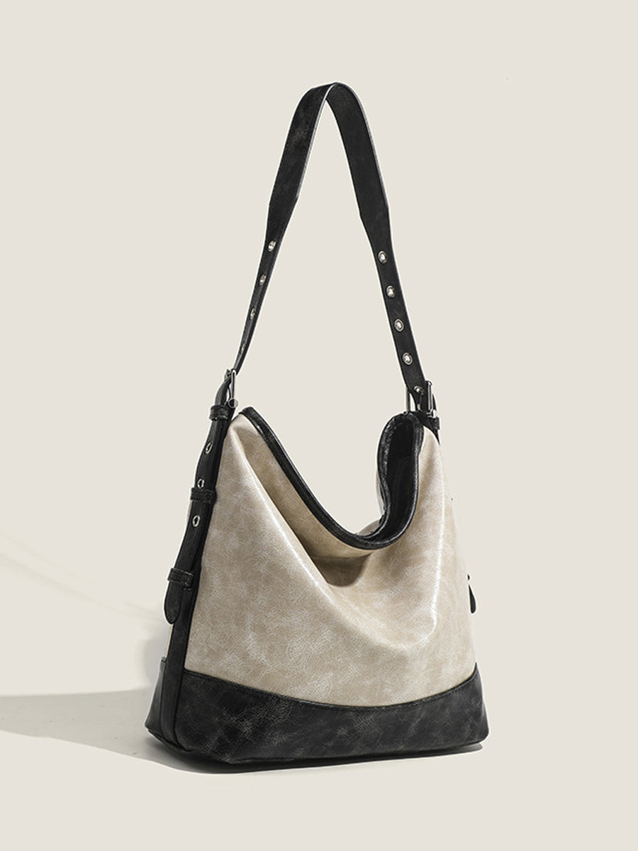 Fashionable women's handbag in color blocks