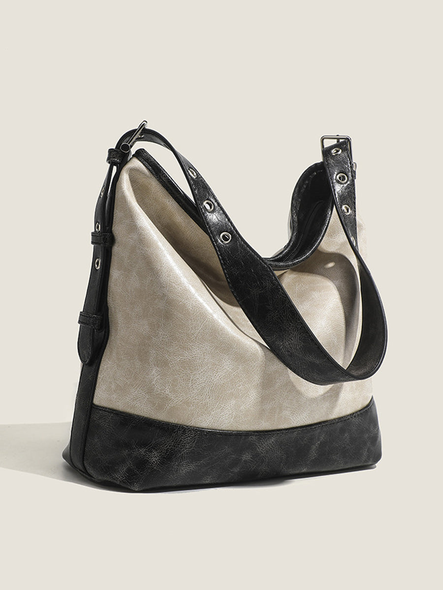 Fashionable women's handbag in color blocks