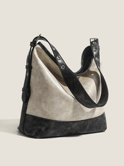 Fashionable women's handbag in color blocks