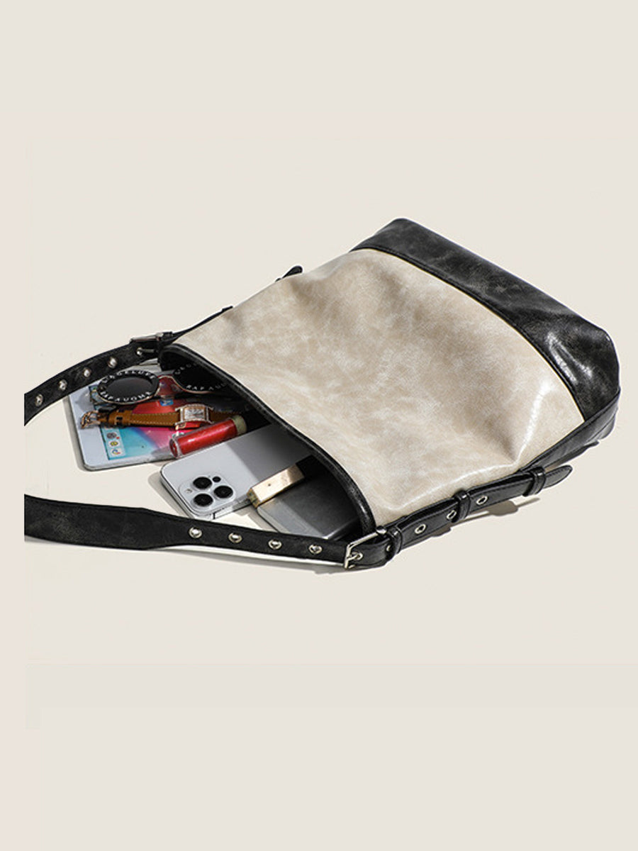 Fashionable women's handbag in color blocks