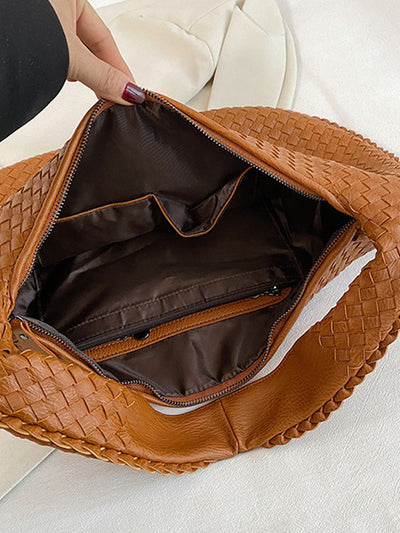Fashionable woven leather handbag