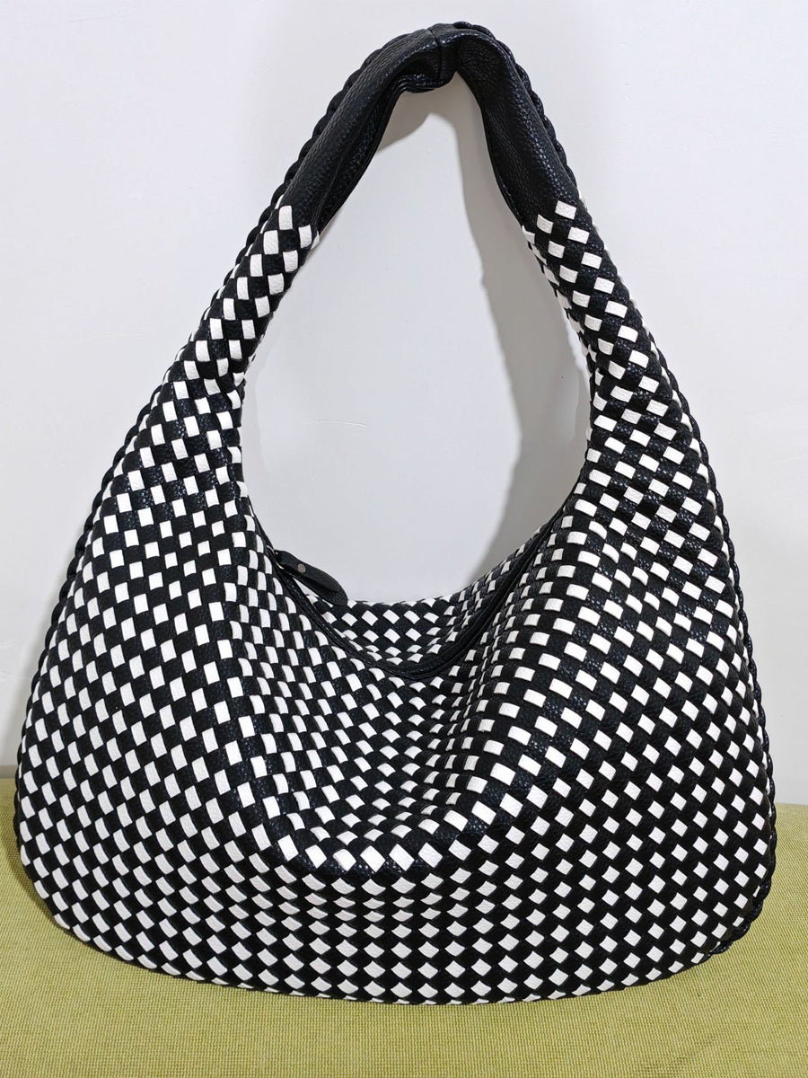 Fashionable woven leather handbag