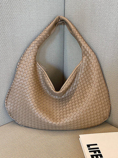 Fashionable woven leather handbag