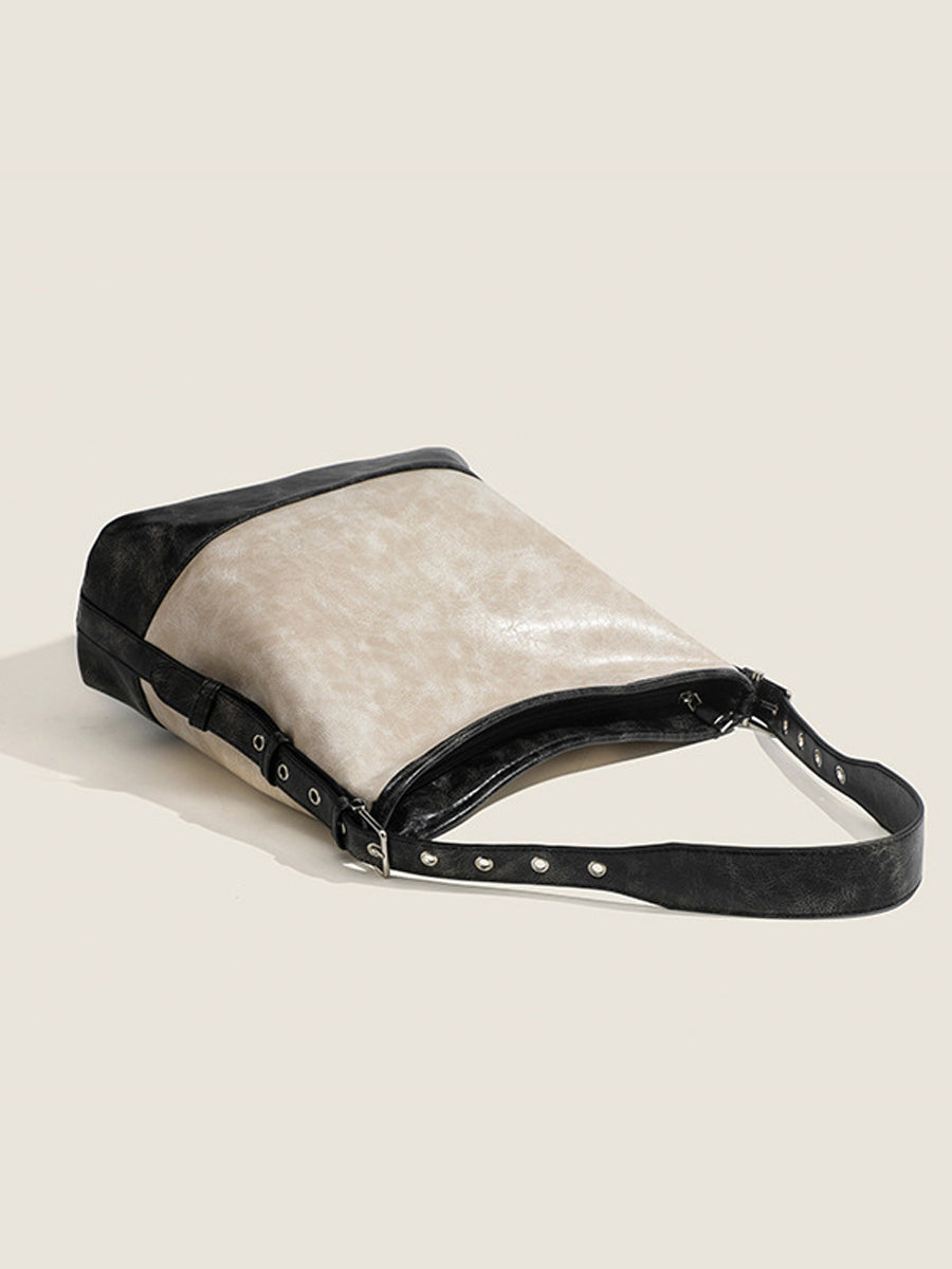 Fashionable women's handbag in color blocks