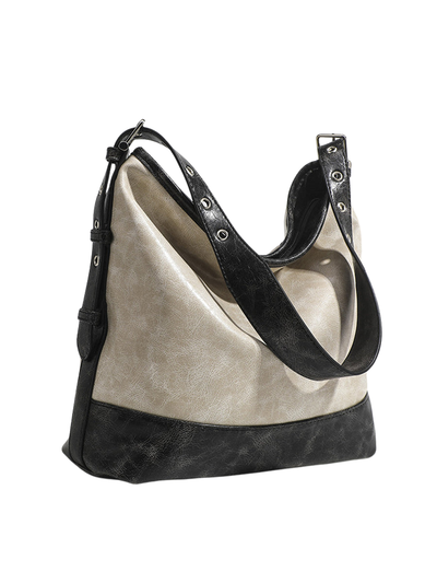 Fashionable women's handbag in color blocks