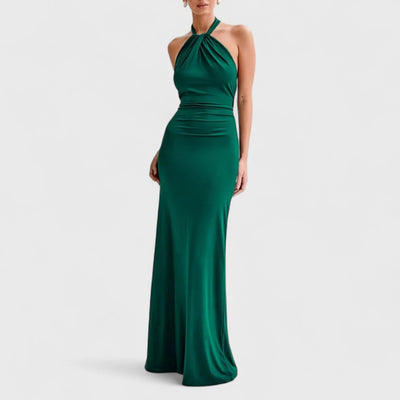 KLARA | Dress with curves and halter neck.
