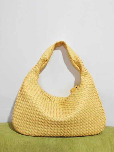 Fashionable woven leather handbag