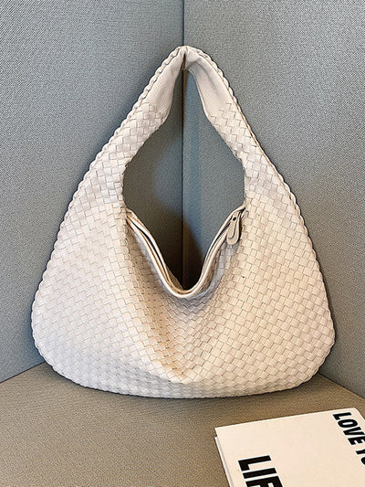 Fashionable woven leather handbag