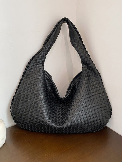 Fashionable woven leather handbag