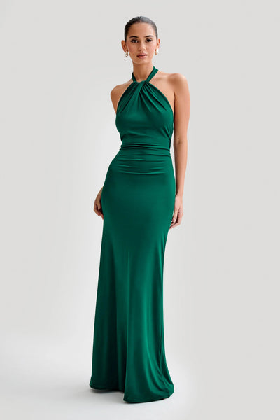 KLARA | Dress with curves and halter neck.