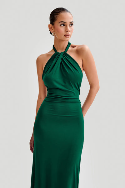 KLARA | Dress with curves and halter neck.